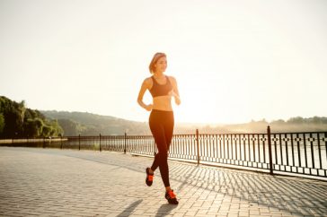 running-woman-runner-jogging-sunny-bright-light-female-fitness-model-training-outside-park_158595-1304